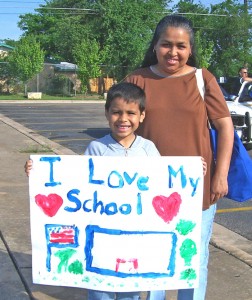 Austin Voices for Education and Youth Community Schools Child Holding I Love My School Poster Rally